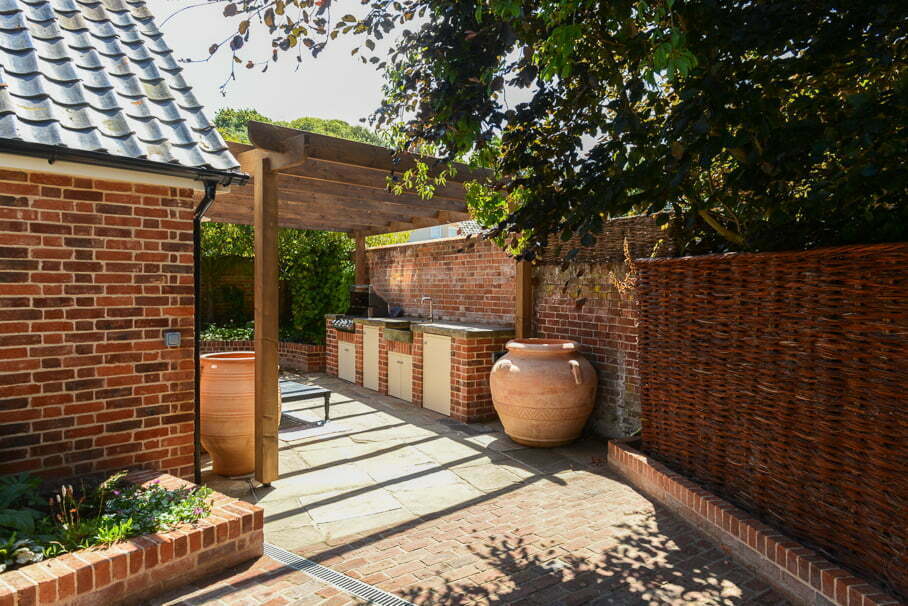 Garden trellis and teracotta furniture